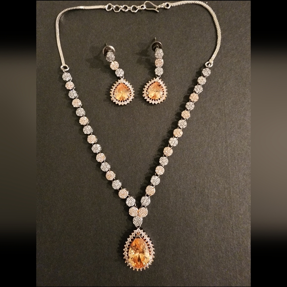 Beautiful necklace and earing set in champagne color.